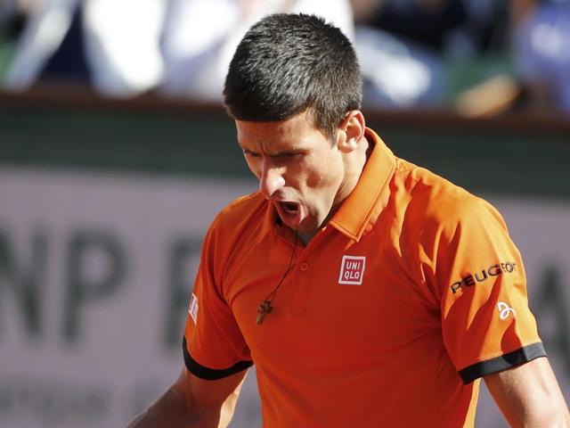 Novak Djokovic of Serbia pumps himself up after winning a long rally during the men's singles final match against Stan Wawrinka of Switzerland at the French Open in Paris, France. (Reuters Photo)