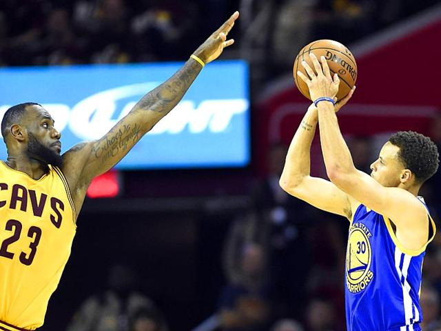 Golden-State-Warriors-guard-Stephen-Curry-30-shoots-the-ball-over-Cleveland-Cavaliers-forward-LeBron-James-23-during-the-fourth-quarter-in-game-three-of-the-NBA-Finals-at-Quicken-Loans-Arena-Bob-Donnan-USA-TODAY-Sports Golden-State-Warriors-guard-Stephen-Curry-30-shoots-the-ball-over-Cleveland-Cavaliers-forward-LeBron-James-23-during-the-fourth-quarter-in-game-three-of-the-NBA-Finals-at-Quicken-Loans-Arena-Bob-Donnan-USA-TODAY-Sports