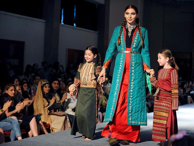 Dressed in Armenia-inspired attires the little ones stole the show with their grace and confidence. (AFP)