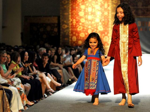 Decked in attractive attires, the children walked the ramp quite confidently, as you can see. (AFP)