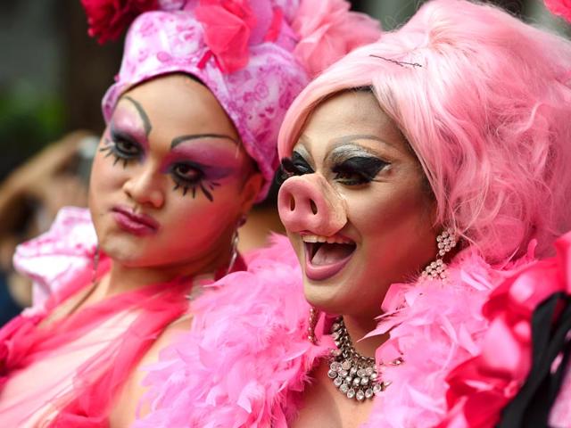 Participants attend the annual "Pink Dot" event in a public show of support for the LGBT community at Hong Lim Park in Singapore on June 13, 2015.(AFP Photo)