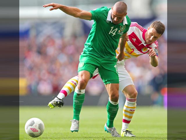 Republic-of-Ireland-s-Jonathan-Walters-14-in-action-with-Scotland-s-Craig-Forsyth-during-their-Uefa-Euro-2016-Group-D-qualifying-match-on-June-13-2015-at-Aviva-Stadium-in-Dublin-Ireland-Reuters-Photo