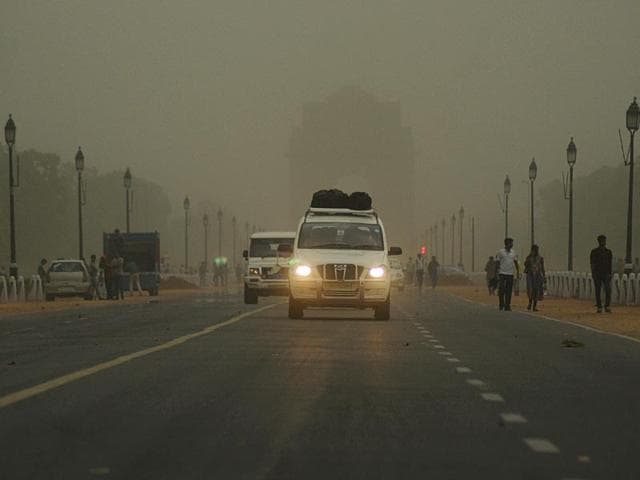 A dust storm accompanied by strong winds and rain hit Delhi and the adjoining NCR region. The change of weather in the national capital has brought in some much needed respite from the extreme heat conditions. (S Bumula/ HT Photo)