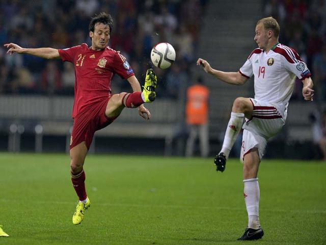 Spain-s-midfielder-David-Silva-L-vies-for-the-ball-with-Belarus-defender-Maksim-Bordachev-during-the-Uefa-Euro-2016-group-C-qualifying-football-match-between-Belarus-and-Spain-in-Borisov-outside-Minsk-on-June-14-2015-AFP-Photo