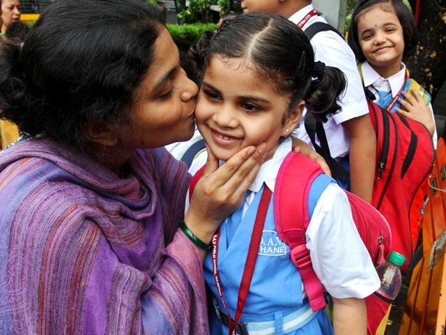 The two-month-long summer vacations are over and the schools have re-opened. Take a look at the hundreds of tiny tots attending their first day at school. (Photo: Praful Gangurde)