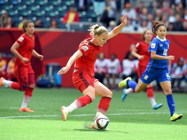 Germany-s-forward-Lena-Petermann-C-kicks-the-ball-at-Thailand-s-goalpost-during-their-Group-B-football-match-of-the-2015-Fifa-Women-s-World-Cup-at-the-Winnipeg-Stadium-in-Winnipeg-Canada-on-June-15-2015-AFP-Photo Germany-s-forward-Lena-Petermann-C-kicks-the-ball-at-Thailand-s-goalpost-during-their-Group-B-football-match-of-the-2015-Fifa-Women-s-World-Cup-at-the-Winnipeg-Stadium-in-Winnipeg-Canada-on-June-15-2015-AFP-Photo