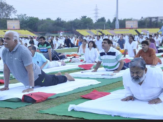 Power Yoga classes organised jointly by Haryana AYUSH department and Sports and Youth Affairs at Tau Devi Lal Stadium, Panchkula. Sant Arora/HT