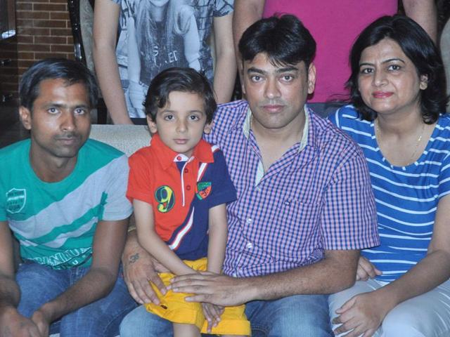 Bhavesh-who-lost-his-mother-in-an-accident-and-father-to-illness-with-uncle-Vijay-and-Ravinder-Thakur-who-runs-an-orphanage-Sant-Arora-HT