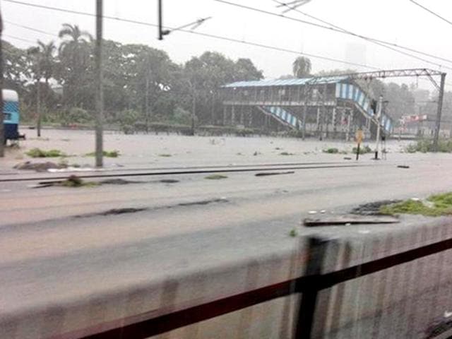 Waterlogged railway tracks have crippled the local trains in Mumbai (Photo by @kkordea01)
