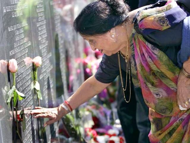A-woman-touches-the-name-of-a-family-member-on-the-memorial-for-the-victims-of-Air-India-Flight-182-on-the-Toronto-waterfront-Reuters-File-Photo A-woman-touches-the-name-of-a-family-member-on-the-memorial-for-the-victims-of-Air-India-Flight-182-on-the-Toronto-waterfront-Reuters-File-Photo