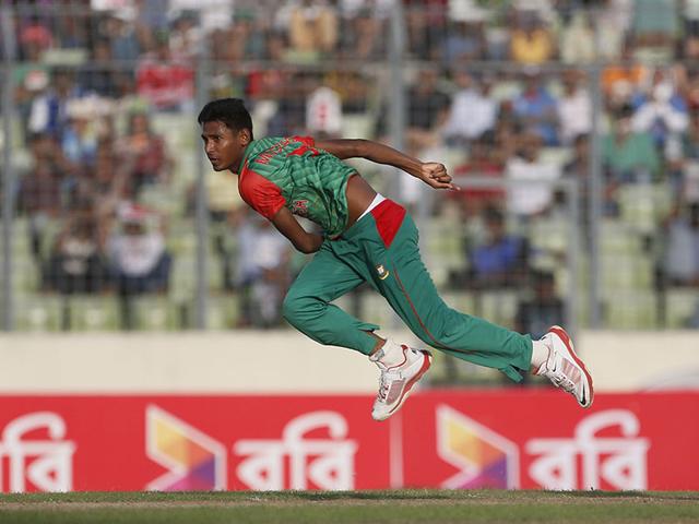 Bangladesh-s-Mustafizur-Rahman-celebrates-with-teammates-the-dismissal-of-India-s-Ravichandran-Ashwin-during-the-first-one-day-international-cricket-match-between-them-in-Dhaka-AP-Photo