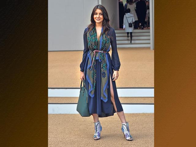 Anushka Sharma: Anushka added colour to this ink blue dress by wrapping a scarf around her neck and adding a belt to accentuate her waist. The scarf also hid a little bit of cleavage and gave the actor a classy look.