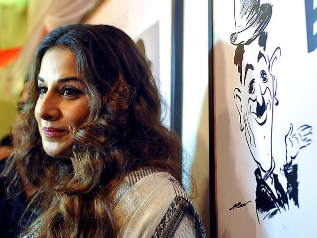 Vidya Balan inaugurates the exhibition "Chaplin Lines" to honour the legendary actor, Charlie Chaplin in Mumbai on June 25, 2015. (AFP Photo)