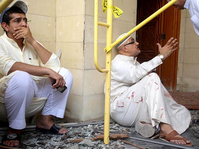 Kuwaiti-men-react-at-the-site-of-a-suicide-bombing-that-targeted-the-Shiite-Al-Imam-al-Sadeq-mosque-during-Friday-prayers-in-Kuwait-City-AFP-Photo