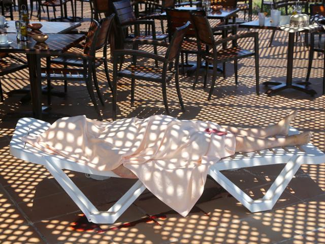 A-body-is-covered-near-a-Tunisian-beach-in-Sousse-At-least-38-people-were-killed-and-36-wounded-when-a-gunman-opened-fire-on-holidaymakers-at-a-Tunisian-beach-resort-hotel-AP-Photo A-body-is-covered-near-a-Tunisian-beach-in-Sousse-At-least-38-people-were-killed-and-36-wounded-when-a-gunman-opened-fire-on-holidaymakers-at-a-Tunisian-beach-resort-hotel-AP-Photo