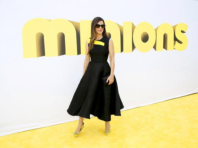 She is one in a minion: Sandra Bullock arrives for Minions premiere. (Reuters)