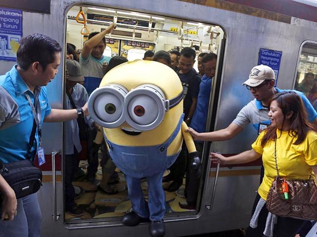 A minion takes a metro in Indonesia, everybody has a good time. (AP photo)