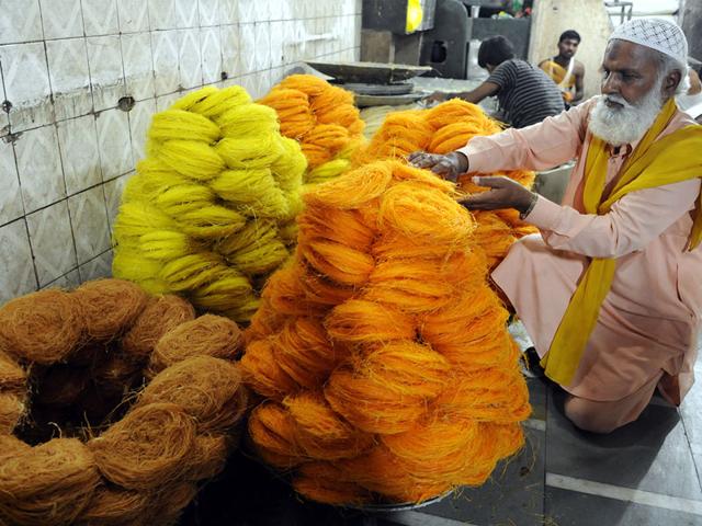 A shopkeeper arranges sevaiyyan (vermicelli) in Indore on Sunday. Sevaiyyan is part-and-parcel of Ramzan festivities and usually cooked in sweet milk. (Arun Mondhe/HT)