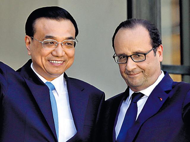 Beijing-s-anticipated-contribution-to-a-roster-of-carbon-curbing-pledges-was-announced-by-PM-Li-Keqiang-L-when-he-met-French-President-Francois-Hollande-in-Paris-on-Tuesday-REUTERS-Photo
