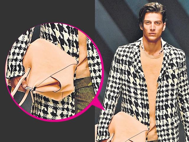 Nudge of nude outfits in clashing prints toned down with a sombre nude tote man bag at the Ermanno Scervino showcase in Paris, France. Nudge of nude outfits in clashing prints toned down with a sombre nude tote man bag at the Ermanno Scervino showcase in Paris, France.