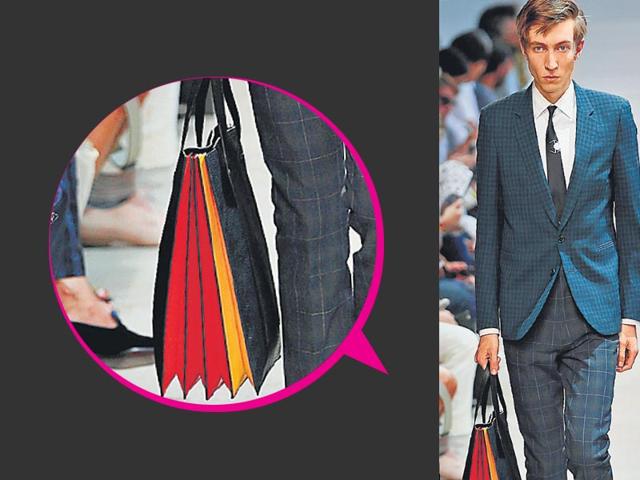Add an edge to your sharp suit with a colourful carry-all bag. Get inspired by this Paul Smith creation at the Men’s Fashion Week, Paris. Add an edge to your sharp suit with a colourful carry-all bag. Get inspired by this Paul Smith creation at the Men’s Fashion Week, Paris.