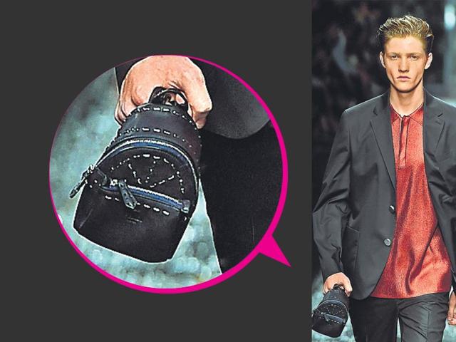 Can’t carry a man-bag? Take a cue from Fendi spring/summer show to rock a cool palm rucksack with studded accents and carry your essentials in style. Can’t carry a man-bag? Take a cue from Fendi spring/summer show to rock a cool palm rucksack with studded accents and carry your essentials in style.