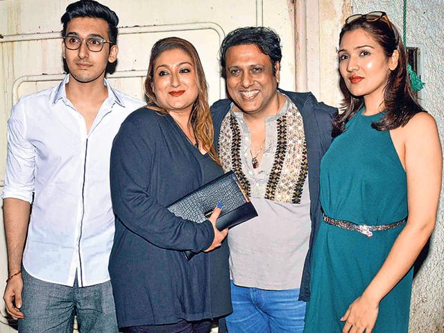 Govinda with his wife, Sunita Ahuja, daughter Tina Ahuja and son Yashvardhan Ahuja at a screening of Second Hand Husband (Photo: Yogen Shah) Govinda with his wife, Sunita Ahuja, daughter Tina Ahuja and son Yashvardhan Ahuja at a screening of Second Hand Husband (Photo: Yogen Shah)