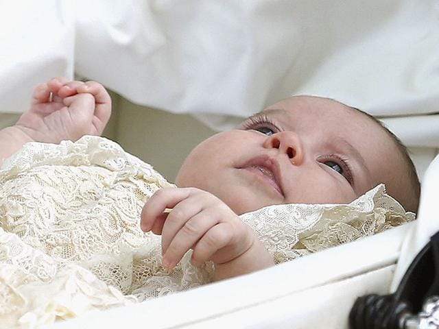 World, meet Princess Charlotte. William and Catherine's daughter was christened on Sunday as her two-year-old brother George stole the show. (Reuters)