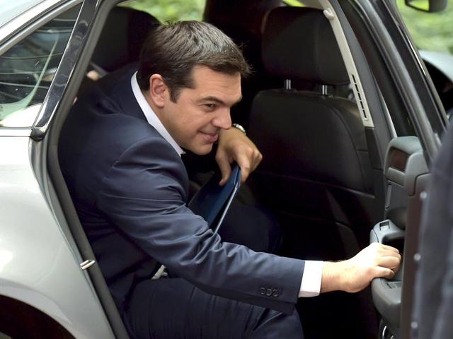 Greek-government-ministers-applaud-Prime-Minister-Alexis-Tsipras-front-right-after-his-speech-in-an-emergency-Parliament-session-for-the-government-s-proposed-referendum-in-Athens-AP-Photo Greek-government-ministers-applaud-Prime-Minister-Alexis-Tsipras-front-right-after-his-speech-in-an-emergency-Parliament-session-for-the-government-s-proposed-referendum-in-Athens-AP-Photo