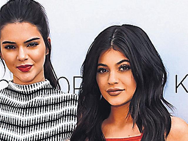 Kendall and Kylie Jenner at a recent event. (Danny Moloshok/Reuters)