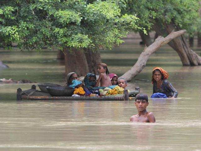 Villagers wade through floodwaters in Rajanpur, Pakistan. The country's military has deployed helicopters and boats to evacuate flood victims, as 285,000 people have been affected by monsoon rains and flash floods. (AP Photo) Villagers wade through floodwaters in Rajanpur, Pakistan. The country's military has deployed helicopters and boats to evacuate flood victims, as 285,000 people have been affected by monsoon rains and flash floods. (AP Photo)