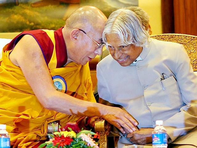 Kalam speaks to Tibetan spiritual leader His Holiness the 14th Dalai Lama in New Delhi, in November 2012. (PTI file photo)