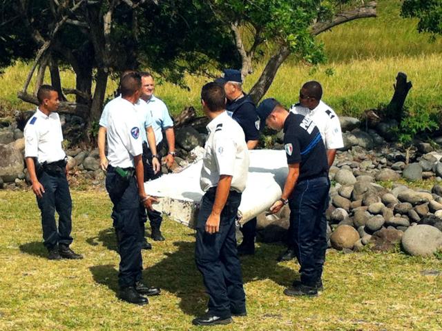 Investigators-from-France-s-air-crash-agency-find-debris-that-is-almost-certainly-from-a-Boeing-777-sparking-hopes-that-the-remains-of-Malaysia-Airlines-flight-MH370-which-disappeared-last-year-may-have-been-found-AFP Investigators-from-France-s-air-crash-agency-find-debris-that-is-almost-certainly-from-a-Boeing-777-sparking-hopes-that-the-remains-of-Malaysia-Airlines-flight-MH370-which-disappeared-last-year-may-have-been-found-AFP