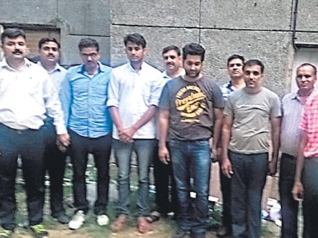 L-R-Sunil-Panwar-in-blue-shirt-Mohammad-Juber-Ranchit-Khurana-and-Praveen-Jha-accused-in-the-DU-fake-admission-scam L-R-Sunil-Panwar-in-blue-shirt-Mohammad-Juber-Ranchit-Khurana-and-Praveen-Jha-accused-in-the-DU-fake-admission-scam