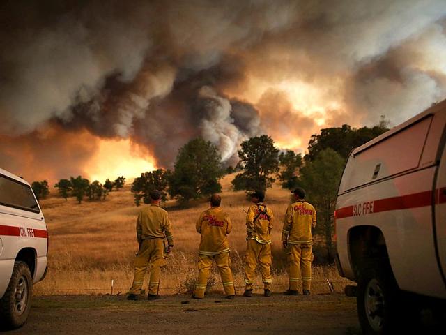 California-firefighters-watch-a-large-plume-of-smoke-as-it-rises-from-the-Rocky-Fire-near-Clearlake-California-AFP-Photo California-firefighters-watch-a-large-plume-of-smoke-as-it-rises-from-the-Rocky-Fire-near-Clearlake-California-AFP-Photo