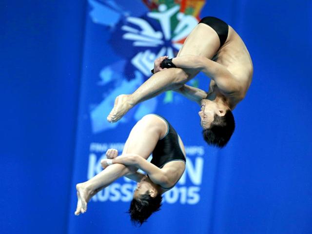 Japan's Minami Itahashi and Yu Okamoto compete in the mixed synchronised 10m platform diving final. (AP Photo) Japan's Minami Itahashi and Yu Okamoto compete in the mixed synchronised 10m platform diving final. (AP Photo)