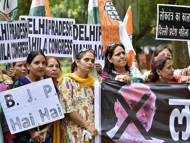 Mahila Congress activists protest outside BJP office in Delhi against the suspension of the party's 25 MPs by the Lok Sabha Speaker. (PTI Photo)