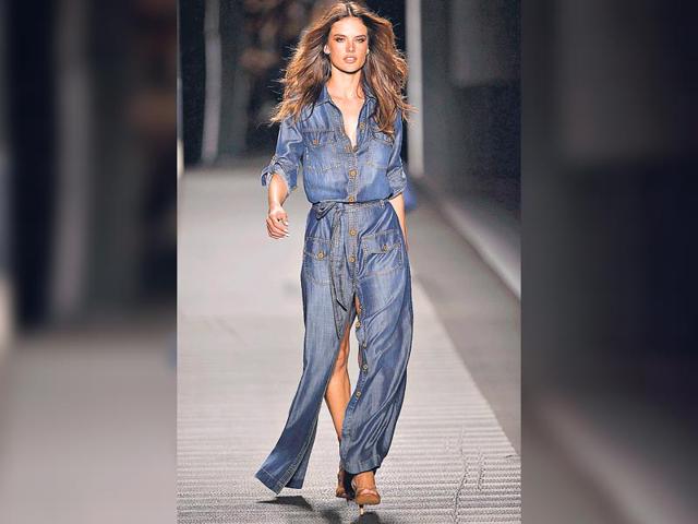 Try the breezy denim beachwear like model Alessandra Ambrosio who presents a creation by designer Jorge Duque.