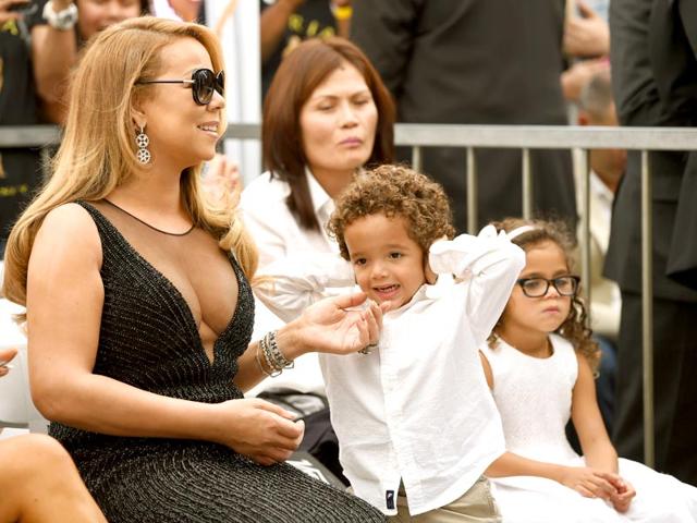 Mariah Carey is the mother of fraternal twins, Monroe and Moroccan, with her estranged husband Nick Cannon. (AP)