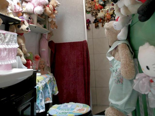 Even her bathroom is adorned with dolls. (Reuters Photo/ Juan Carlos Ulate)