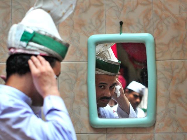 What has not changed is the brand's loyalty to the green turban and the 'cummerbund' of waiters. Ravi Kumar/HT
