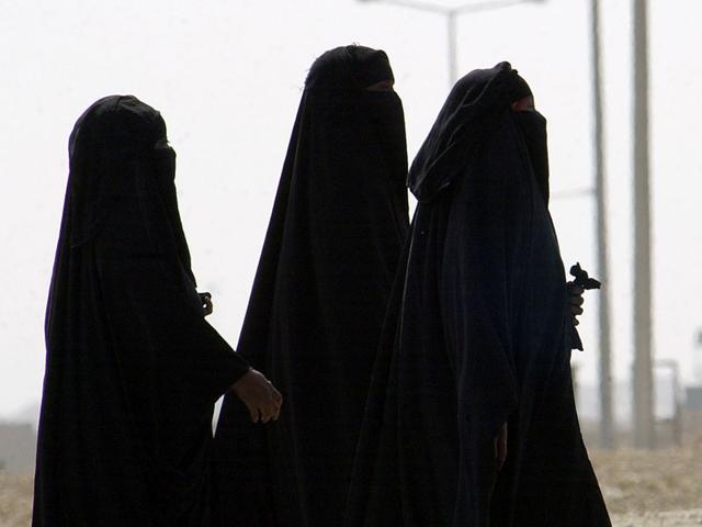 A-file-photo-of-Saudi-women-walking-along-a-suburban-street-in-Riyadh-Saudi-Arabia-AP-Photo A-file-photo-of-Saudi-women-walking-along-a-suburban-street-in-Riyadh-Saudi-Arabia-AP-Photo