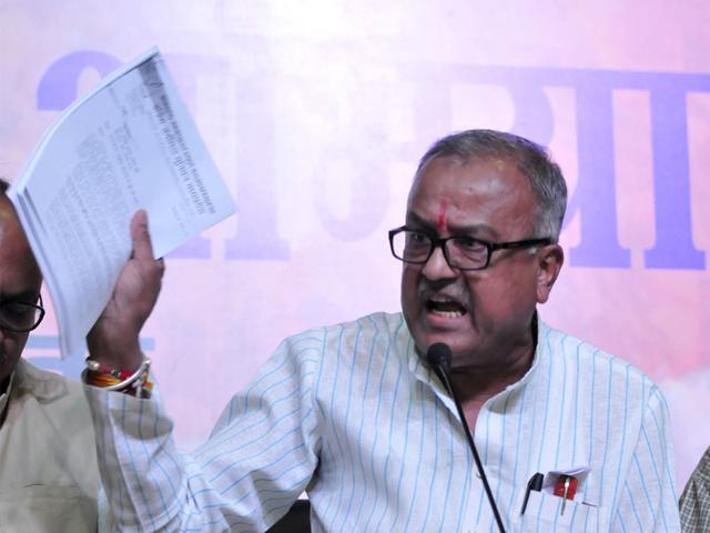BJP state president Nandkumar Singh Chauhan addressing a press conference in Bhopal on Saturday. (Praveen Bajpai/HT)