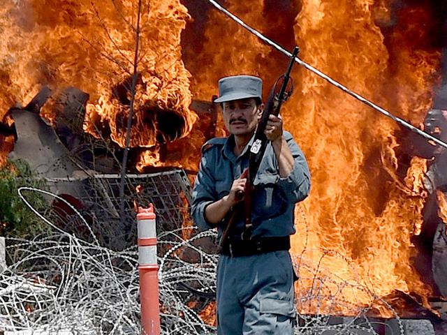 An-Afghan-policeman-keeps-watch-at-the-site-of-a-bomb-blast-in-Kabul-AFP-Photo An-Afghan-policeman-keeps-watch-at-the-site-of-a-bomb-blast-in-Kabul-AFP-Photo