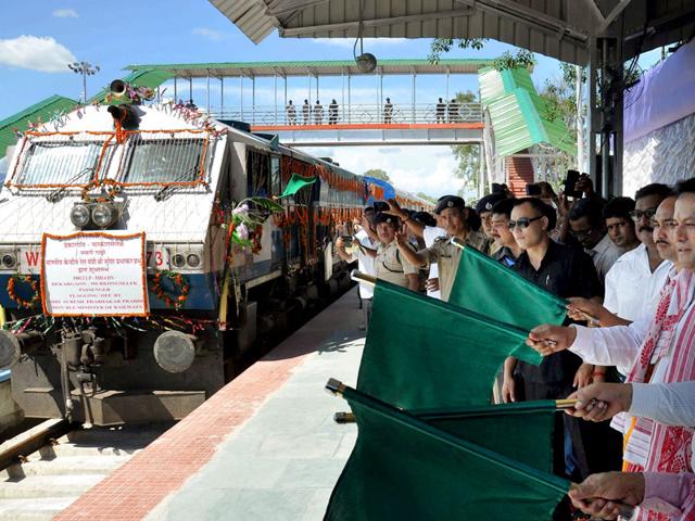 Union-Minister-of-State-for-Sports-and-Youth-Affairs-Sarbananda-Sonowal-along-with-RS-Birdi-GM-NF-Railway-flagging-off-the-Murkongselek-Guwahati-Inter-City-Express-and-Murkongselek-Dekargaon-Express-at-Murkongselek-Railway-Station-PTI-Photo Union-Minister-of-State-for-Sports-and-Youth-Affairs-Sarbananda-Sonowal-along-with-RS-Birdi-GM-NF-Railway-flagging-off-the-Murkongselek-Guwahati-Inter-City-Express-and-Murkongselek-Dekargaon-Express-at-Murkongselek-Railway-Station-PTI-Photo