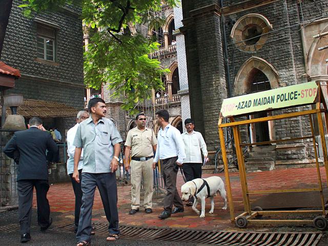 Dog squad of the Mumbai police at work after a high alert was sounded at the Bombay high court. (Photo credit: Bhushan Koyande)