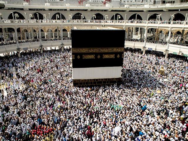Pilgrims circle the Kaaba, the cubic building at the Grand Mosque in the Muslim holy city of Mecca, Saudi Arabia. Despite the crane accident, almost one million pilgrims arrivedahead of the haj. (AP Photo)