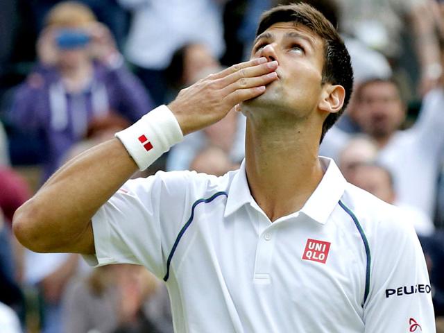 Novak Djokovic of Serbia celebrates after winning his men's singles quarter-finals match of the 2015 Wimbledon Championships against Marin Cilic of Croatia at The All England Lawn Tennis and Croquet Club in London, on July 8, 2015. Djokovic won 6-4, 6-4, 6-4. (Reuters Photo)