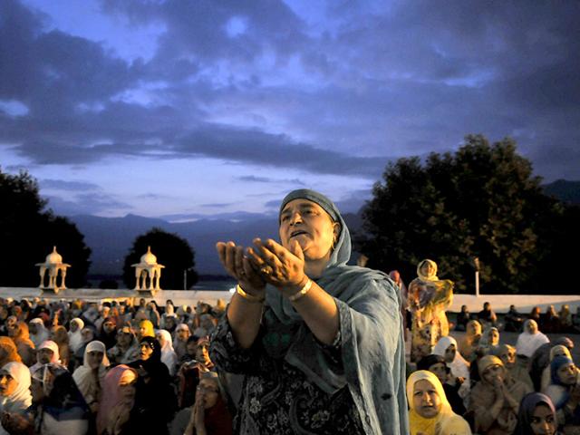 A Kashmiri devotee prays early in the morning at the Hazratbal shrine, during special prayers to observe the Martyr Day of Hazrat Ali, cousin of the Prophet Muhammad, in Srinagar (HT Photo/ Waseem Andrabi) A Kashmiri devotee prays early in the morning at the Hazratbal shrine, during special prayers to observe the Martyr Day of Hazrat Ali, cousin of the Prophet Muhammad, in Srinagar (HT Photo/ Waseem Andrabi)