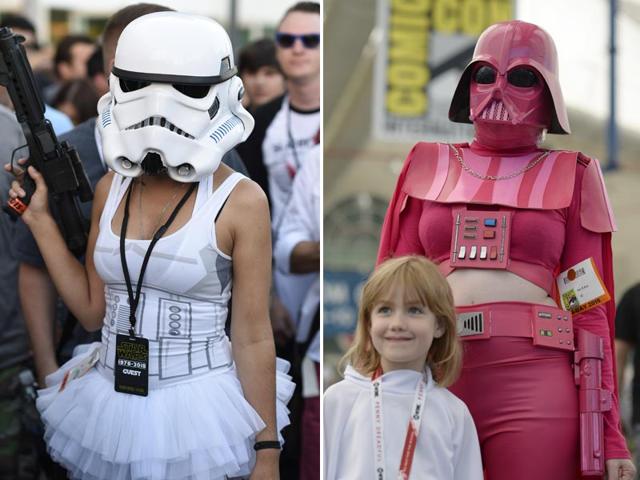 Two women gave their own twist to Stormtrooper and Darth Vader costumes at the fest. (AFP Photos)